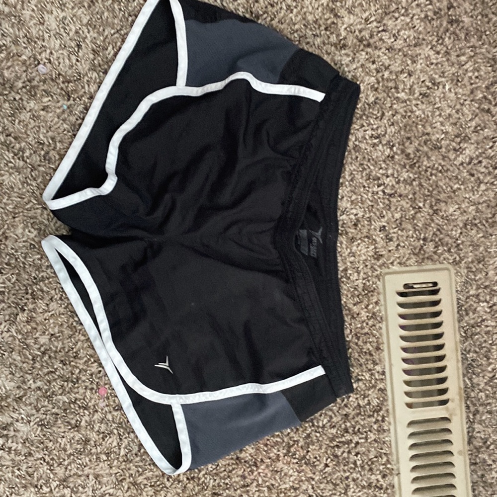 Black shorts with white lining on bottom Active